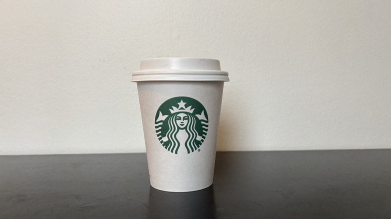 starbucks coffee cup on table