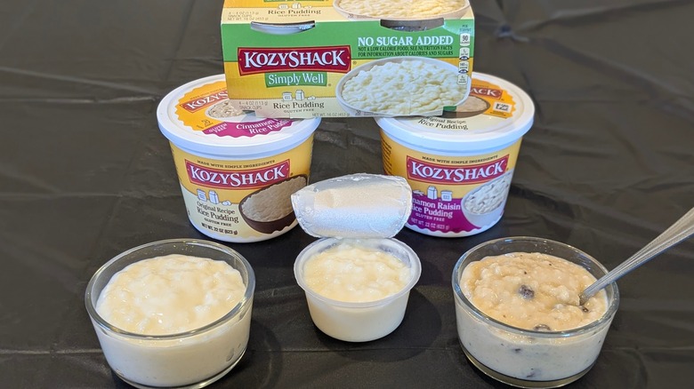 An assortment of Kozy Shack rice pudding varieties next to bowls and cups of rice pudding