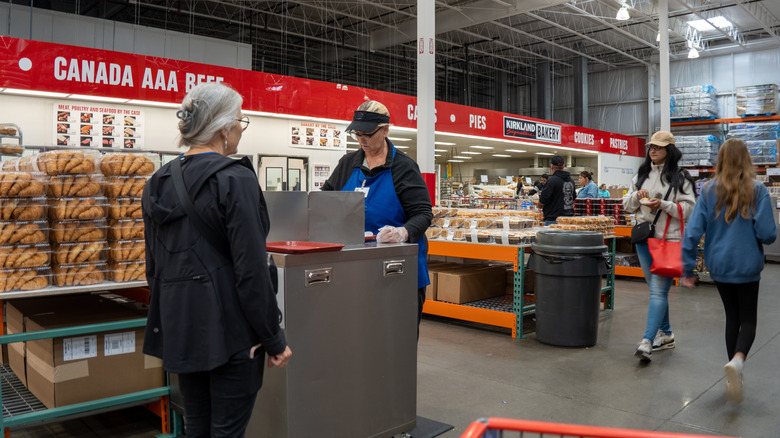 Employee passing out samples at Costco