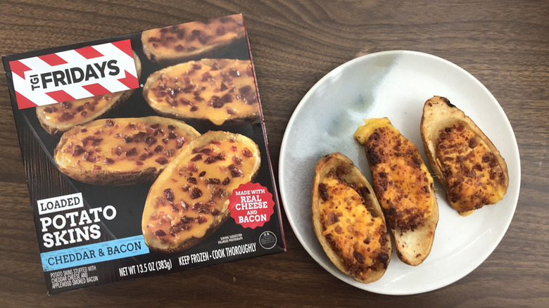 TGI Fridays potato skins on a plate next to the packaging