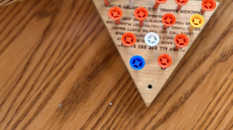 Peg game at Cracker Barrel on wooden table