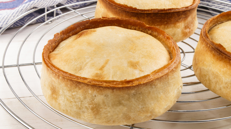 Close-up of Scotch pies on cooling rack