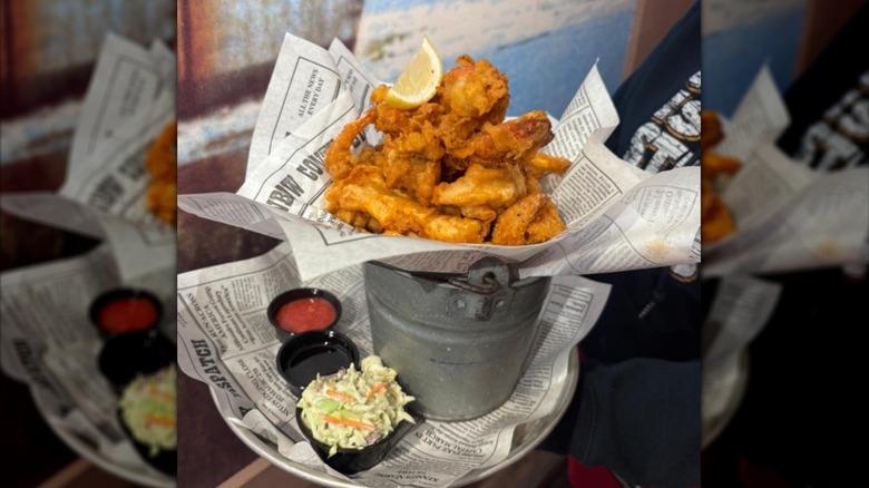 Fried shrimp in a mini bucket on a plate at Bubba Gump Shrimp Co.