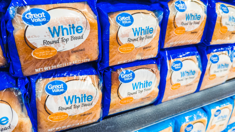 Great Value White Round Top Sliced Bread Loaves Displayed On Bakery Aisle Shelf At Walmart
