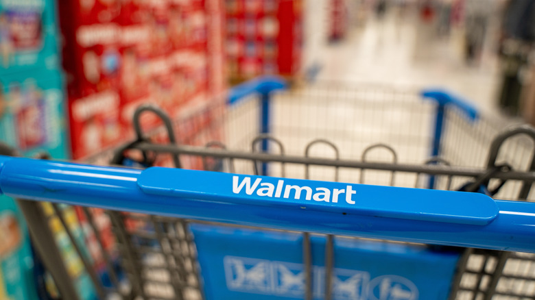 Close up of Walmart shopping cart handle inside store