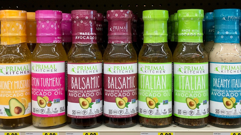 Primal Kitchen salad dressings on a store shelf