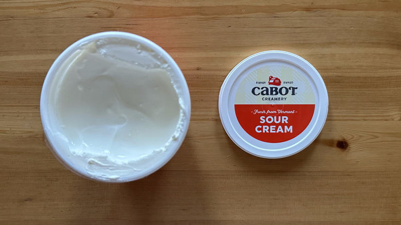Cabot Sour Cream on wooden table