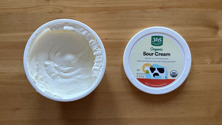 365 Organic Sour Cream on wooden table