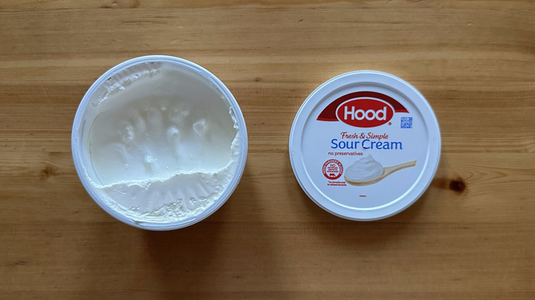 Hood Sour Cream on wooden table