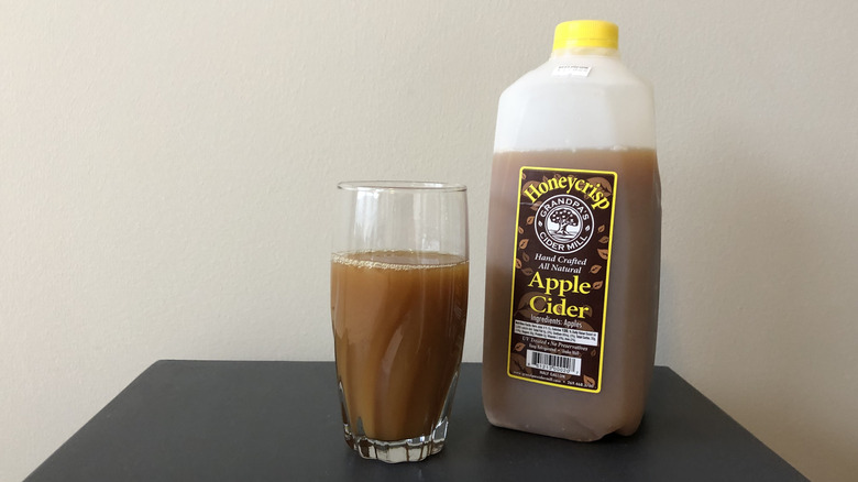 Grandpa's Cider Mill Honeycrisp apple cider in a glass.