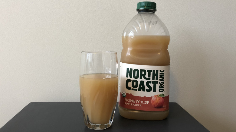 North Coast organic Honeycrisp apple cider in a glass.