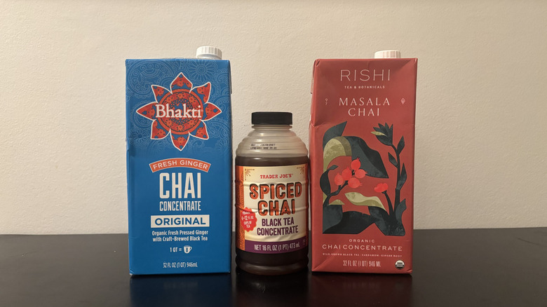 three chai concentrates displayed on table