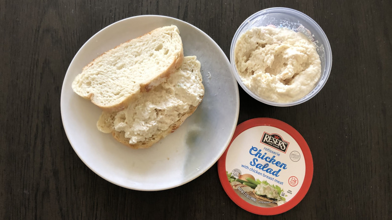 Reser's rotisserie chicken salad on a sandwich on a plate.