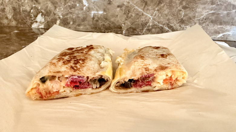 Taco Bell Black Bean Grilled Cheese Burrito cut in half