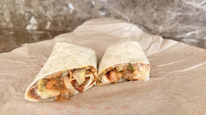 Taco Bell Burrito Supreme cut in half