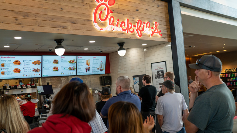 Customers crowding around Chick-Fil-A counter