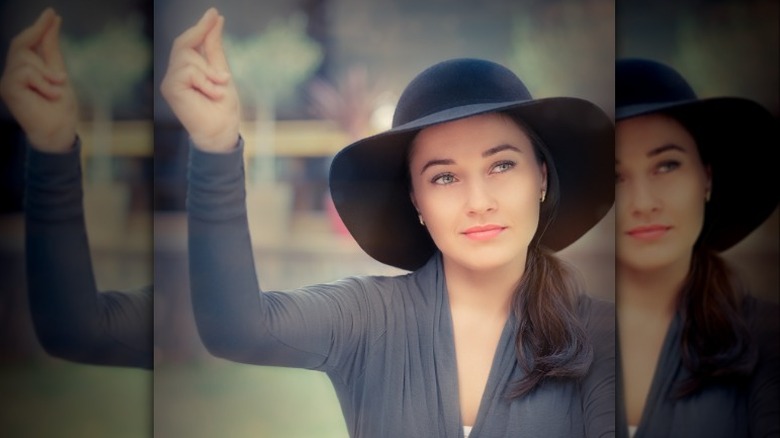 Woman snapping fingers for attention