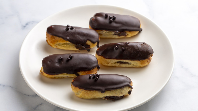 white plate with traditional French eclairs