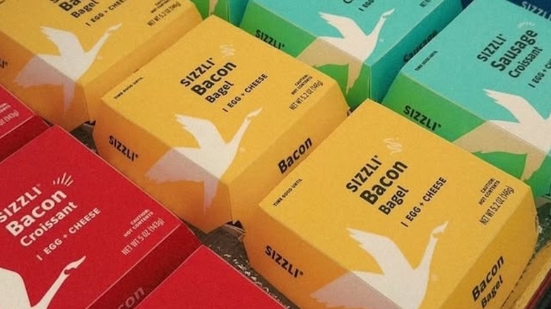 Selection of different-colored boxes of Wawa Sizzli sandwiches