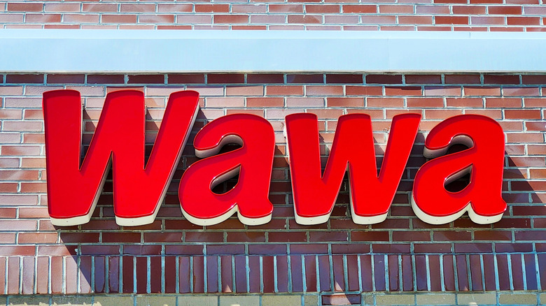Wawa sign on brick background