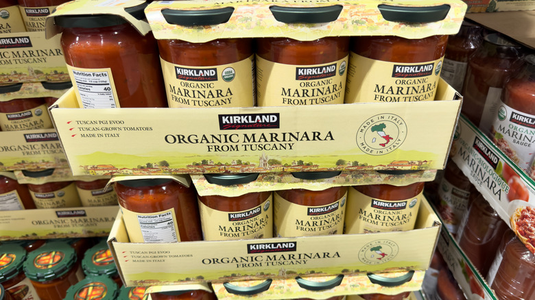 Several jars of Kirkland Signature Organic Marinara Sauce stacked together at Costco