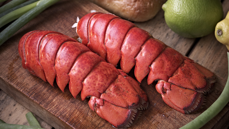 Cooked lobster tails on wood