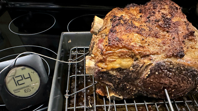 prime rib with meat thermometer in it