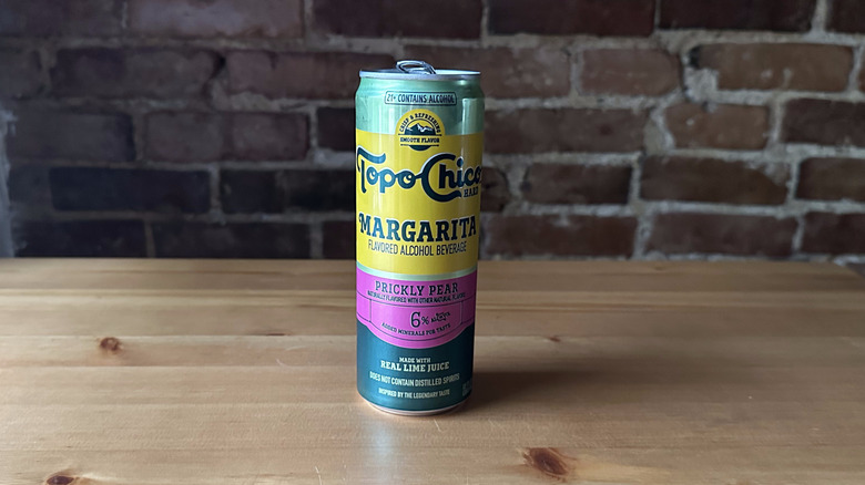 Topo Chico Prickly Pear Margarita on wooden table