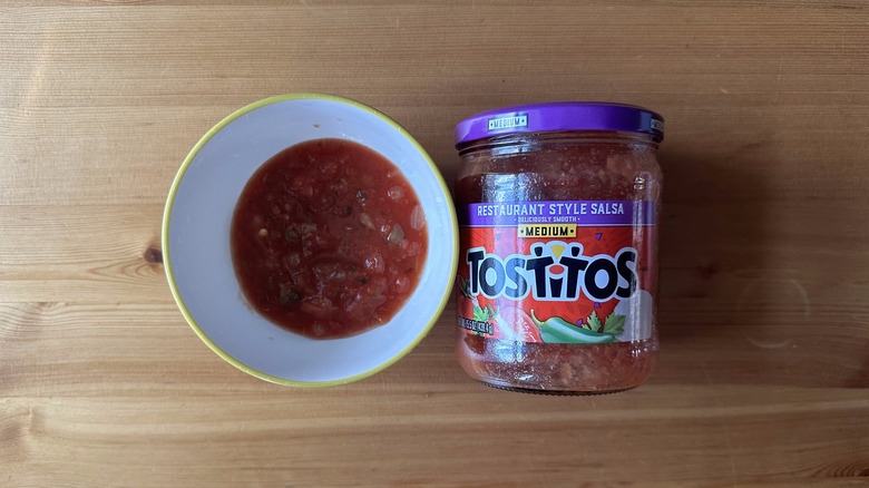 Tostitos Medium Restaurant Style Salsa in bowl on wooden table