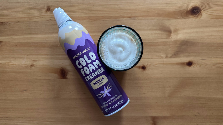 Trader Joe's Vanilla Cold Foam Creamer on wooden table