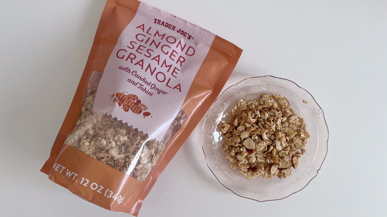 Plate with Almond Ginger Sesame Granola from Trader Joe's next to small bowl of granola