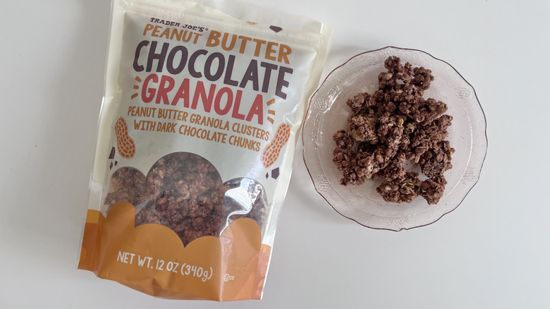 Top view of Peanut Butter Chocolate Granola from Trader Joe's next to small bowl of granola