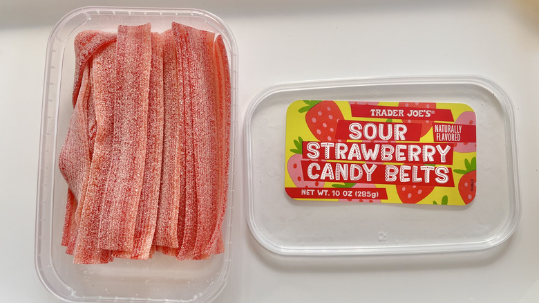 Strawberry sour candy in plastic container