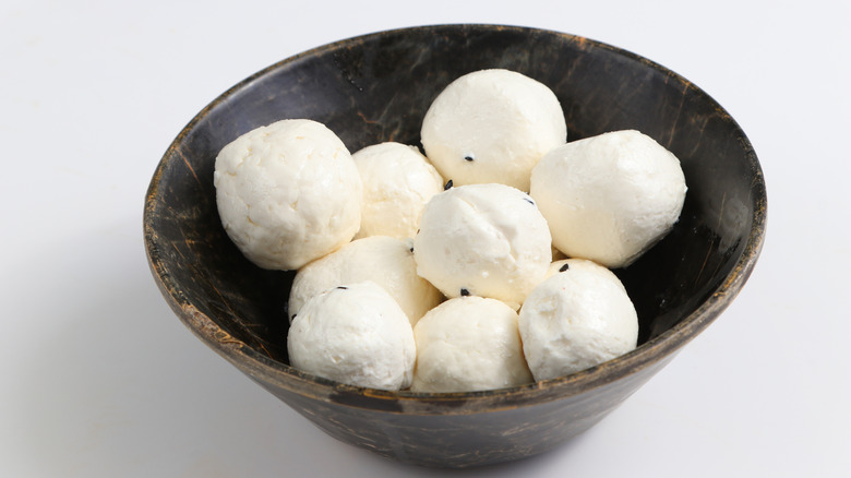 Labaneh balls in a dark bowl