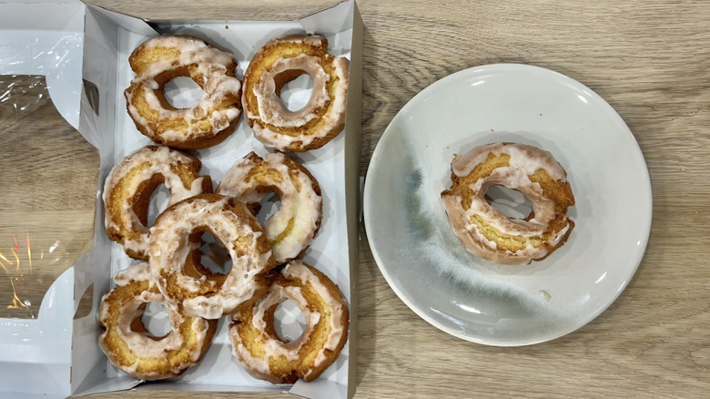 Walmart Freshness Guaranteed Glazed Sour Cream Donut on a plate.