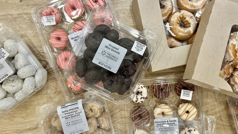 8 different kinds of donuts from Walmart in packages.
