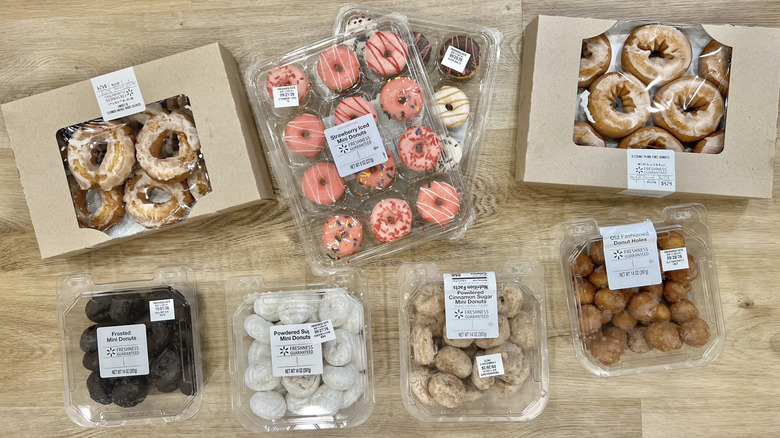 8 different kinds of donuts from Walmart in packages.