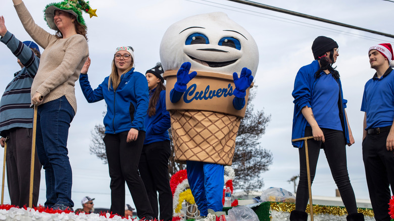 Culver's staff and mascot on a parade float
