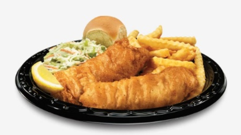 A plate of fried fish, slaw, and fries