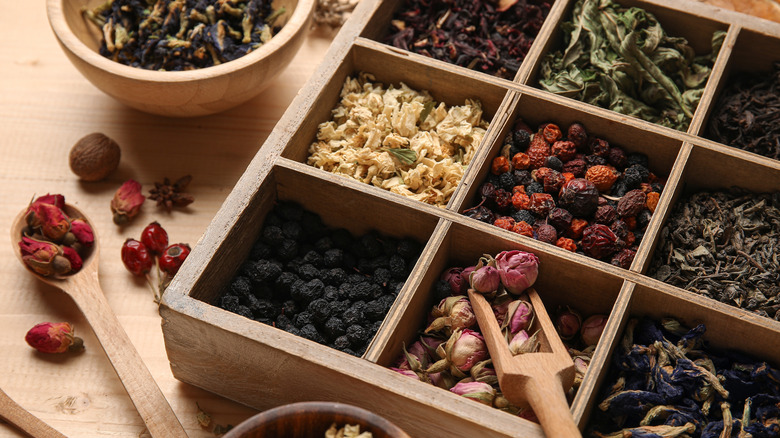 Different types of tea in wooden box