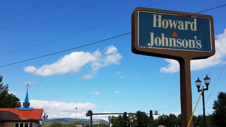 Sign for Howard Johnson's against blue sky