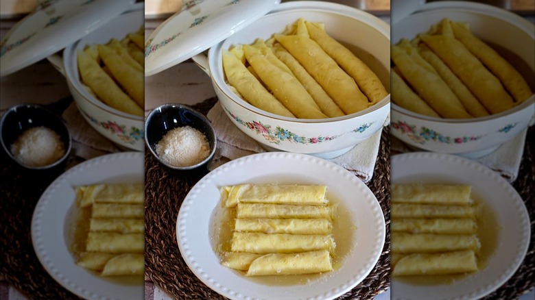 Crespelle in brodo on white serving dishes