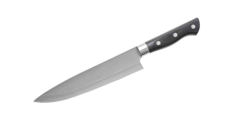 Classic chef's knife against a white background