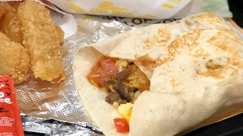 Several Del Taco breakfast items on a tray