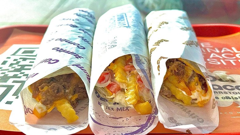 Three Del Taco burritos with Go Bold option