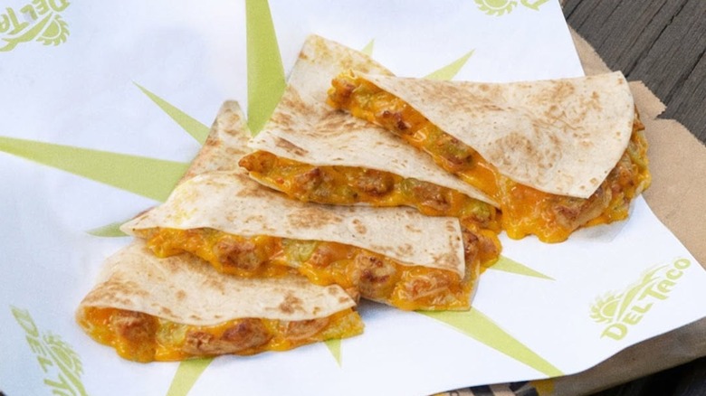 Several Del Taco quesadillas on a tray