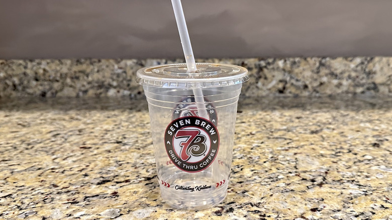 Empty 7 Brew cup on neutral countertop