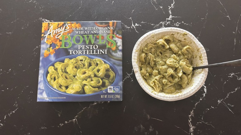 Amy's pesto tortellini frozen meal and box on countertop