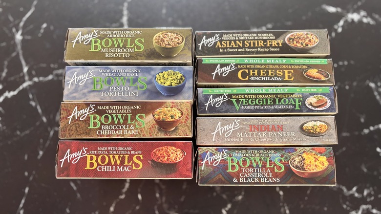 Various Amy's frozen meal boxes lined up on countertop