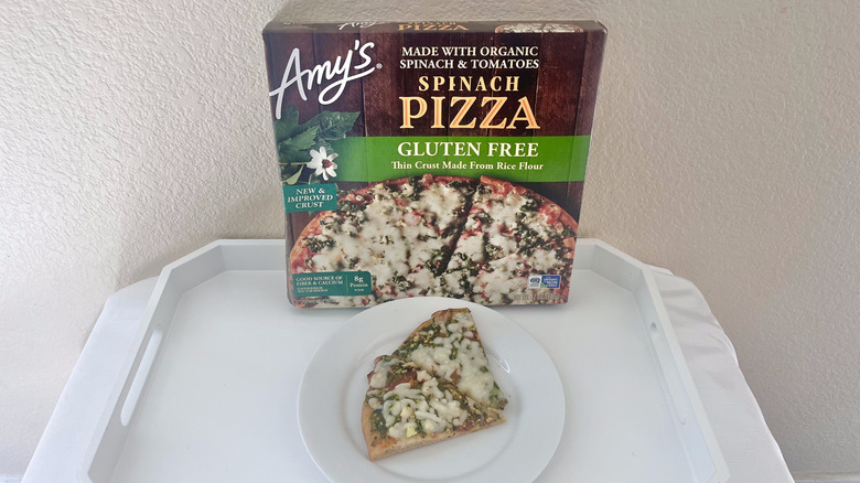 Amy's Pizza Gluten Free Spinach slices on a plate with a box showcased in the back